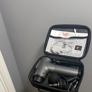 Gray Massage Gun with Accessories